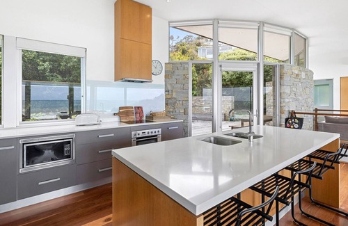 Separation Creek House | Oceanfront Retreat at Sandbanks, Perfect for Families & Pets