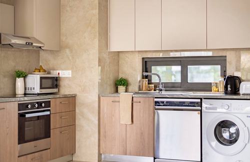 Agios Tychon Apartment | Sanders River Plaza: Cozy 2-Bedroom with Pool & Balcony