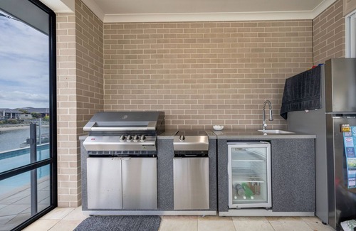 Yamba House | Sandgard: Waterfront Serenity with Private Pool Access