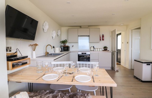 Eype Cottage | Experience Sandpiper Chalet: Oceanfront Retreat in Eype