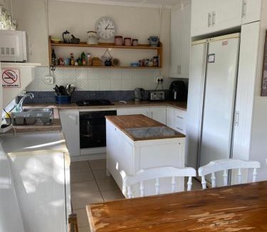 Seafield House | Experience Sandpiper Cottage: Pet & Child Friendly Haven