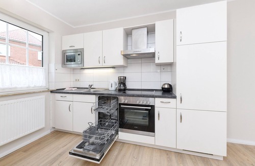 Neuharlingersiel Apartment | Oceanfront Retreat at Sandpiper - Haus Andreesen