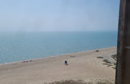 North Beach Condo | Unwind at Sands of Time: 180° Views & Pool Access
