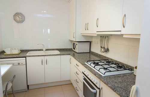 Pobles del Sud Apartment | Beachfront Sandy Beach Apartment with Pool & Spa Amenities
