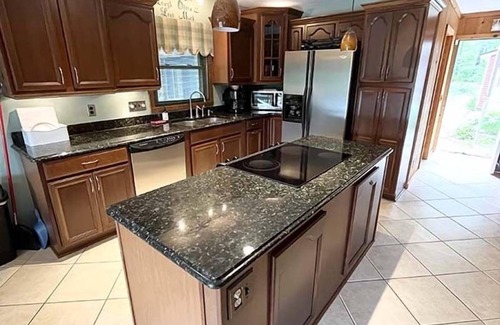 Gladwin Cottage | Idyllic Sandy Beach Chalet with Lake Fire-Pit & Amenities