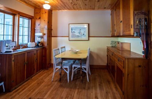 Alden House | Idyllic Sandy Beach Cottage on Torch Lake with Ocean Views