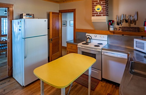 Alden House | Idyllic Sandy Beach Cottage on Torch Lake with Ocean Views