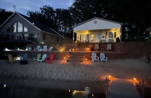 Gladwin House | Idyllic Sandy Beach Front Lake House for Family Getaways