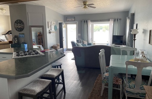 Gladwin House | Idyllic Sandy Beach Front Lake House for Family Getaways
