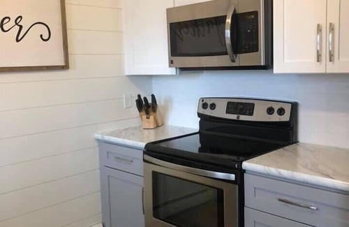 Alexandria House | Relaxing Retreat: 4BR Oasis with Pool & Ocean Views