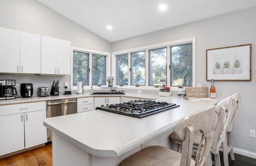 Gladwin House | Experience Sandy Feet: Lakefront Getaway with Beach Access