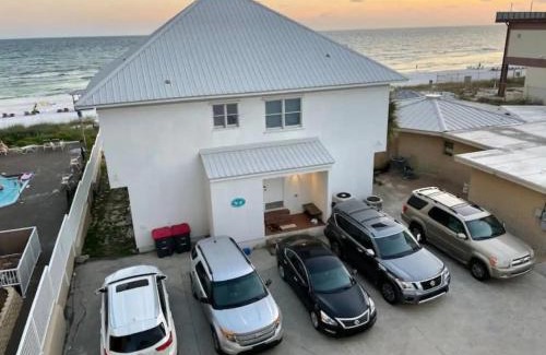 Gulf Lagoon Beach House | Oceanfront Sandy Feet Retreat with Hot Tub & Pet Friendly Stay