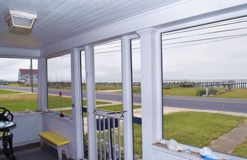 Chincoteague Cottage | Serene Sandy Gem: Waterfront Cottage with Private Dock