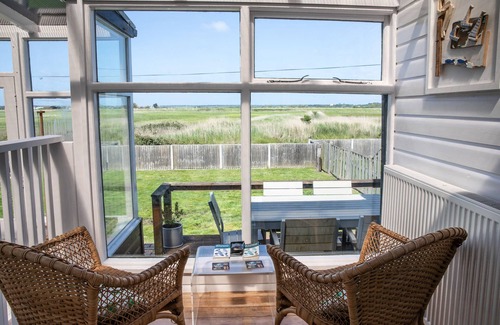 Southwold House | Seaside Escape at Sandy Lodge: Ocean Views & Spa Retreat