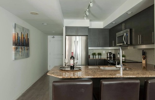 King West Village Condo | Immaculate Condo with Pool and Convenient Parking