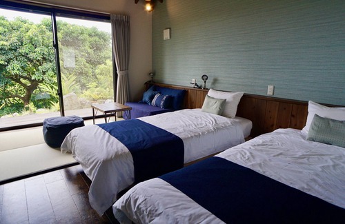 Motobu Cabin | Relax at Sannin Resort: Ocean Views & Spa Amenities Await