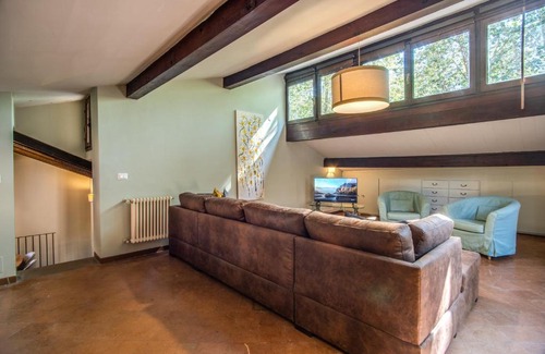 Rione VII Regola Apartment | Elegant Sant'Eligio Attic with Exclusive Terrace in Rome