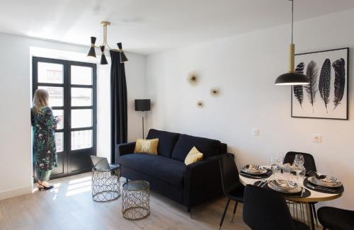 Cimadevilla Apartment | Elegant Santa Catalina Suites in Gijón with Ocean Views