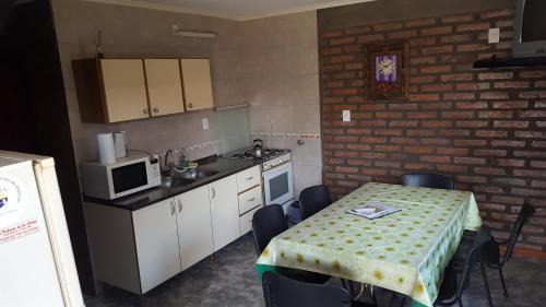 Embalse House | Discover Santa Isabel: Family-Friendly with Pool & Breakfast