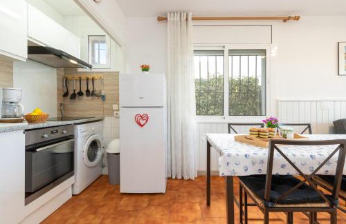 L'Escala Apartment | Discover Santana: Family-Friendly Getaway with Accessibility