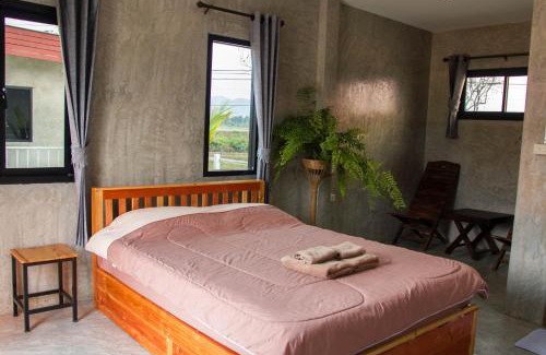 Cho Lae House | Discover Santitham Home Farm Stay: Child-Friendly Escape