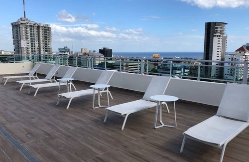 Downtown Santo Domingo Apartment | Rooftop Pool Apartment with Ocean & City Views in Santo Domingo