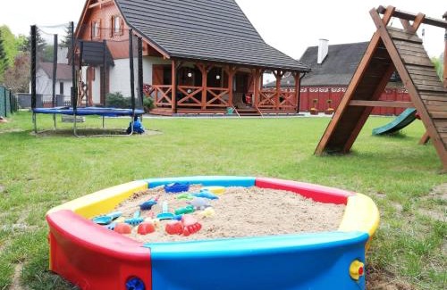 Santoczno House | Experience Santoczno Santohaus: Family-Friendly Retreat