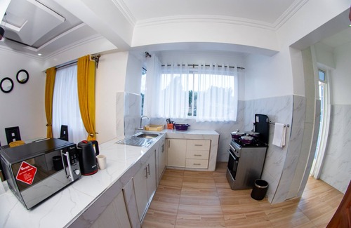 Kisii Apartment | Experience Santorina Home Suites: Pet Friendly & Family