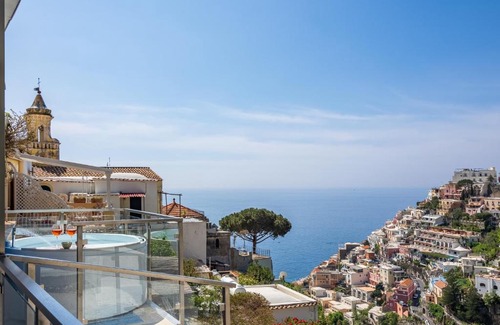 Liparlati Apartment | Relax in the Santoro Suite with Hot Tub & Family Amenities