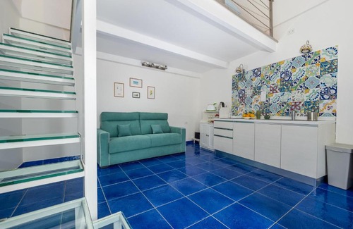 Liparlati Apartment | Relax in the Santoro Suite with Hot Tub & Family Amenities