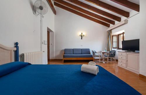 Lluc House | Discover Santuari de Lluc: Pool, Restaurant & Family Fun