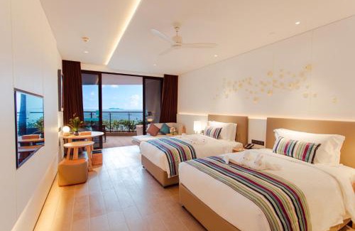 Tianya District Hotel | Relax at Sanya Conifer Resort: Oceanfront Paradise Awaits