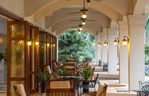 Jiyang Hotel | Oceanfront Bliss at Sanya Resort Golden Palm - 4 Star Retreat