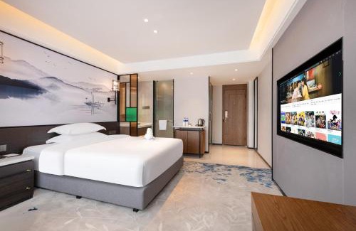 Yuexiu Hotel | Discover Sanyu Hotel: Exceptional 4-Star Stay with Pool