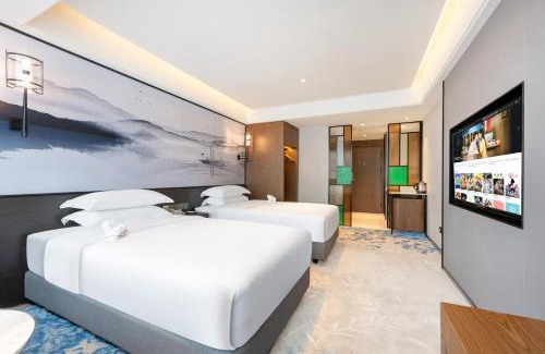 Yuexiu Hotel | Discover Sanyu Hotel: Exceptional 4-Star Stay with Pool