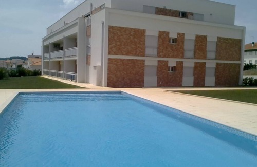 Sao Martinho do Porto Apartment | Oceanfront Escape at Sao Martinho do Porto with Pool Access