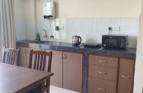 Betalbatim Apartment | Relax at Sapana Meadows: Pool, Breakfast & Family Fun