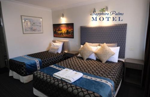 The Entrance Hotel | Discover Sapphire Palms Motel: Poolside Comfort Awaits