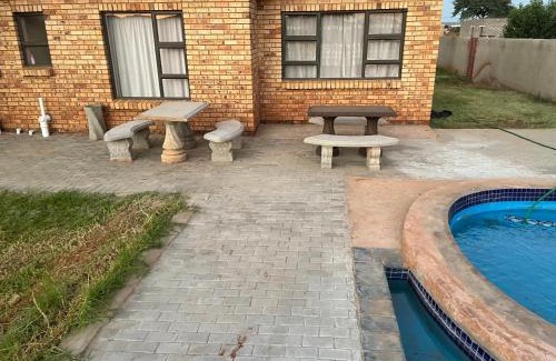 Taung Station House | Oceanfront Retreat at SapzRes in Taung with Pool Access