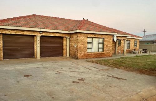 Taung Station House | Oceanfront Retreat at SapzRes in Taung with Pool Access