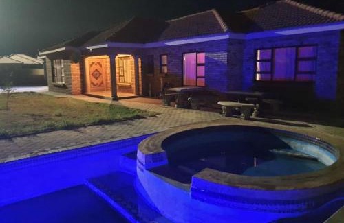 Taung Station House | Oceanfront Retreat at SapzRes in Taung with Pool Access