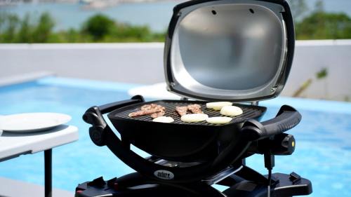 Motobu Villa | Serene Sarah Resort Villa 海: Family-Friendly Pool Retreat