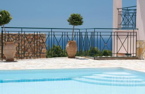 Sarlata Apartment | Experience Tranquility at Sarantos Pool Suites with Ocean View