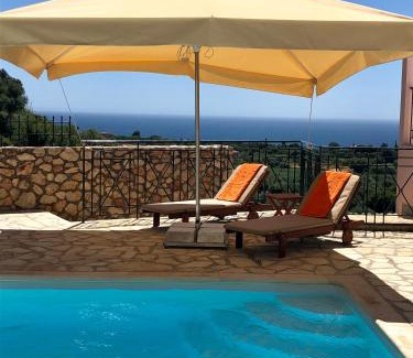 Sarlata Apartment | Experience Tranquility at Sarantos Pool Suites with Ocean View