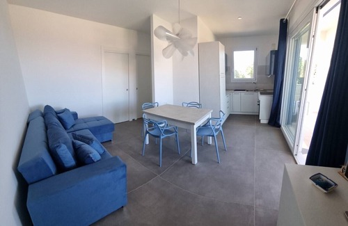 Lu Bagnu Apartment | Coastal Retreat: Lu Bagnu Apartment Steps from the Sea