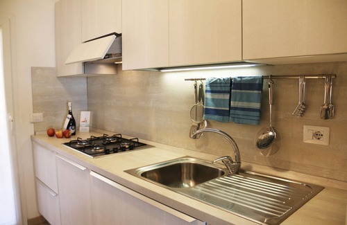 Castelsardo Apartment | Spacious Attico Baja Ostina: Family-Friendly 3-Bedroom Stay