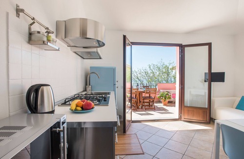 Portoscuso Apartment | Oceanfront Penthouse at Villa del Porto with Pool & Spa