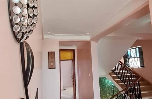Fort Portal Apartment | Cozy SARF Accommodation with Relaxing Hot Tub Experience