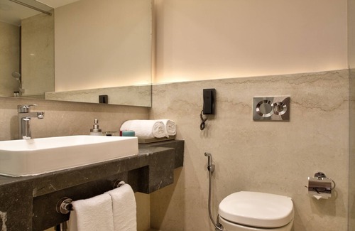 Lalkothi Hotel | Elegant Sarovar Premiere Jaipur with Pool & Family Amenities