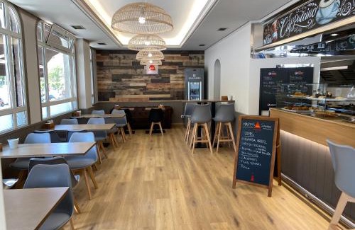 La Coruna Hotel | Inviting Saudade Hostal Cafetería - Family-Friendly Retreat